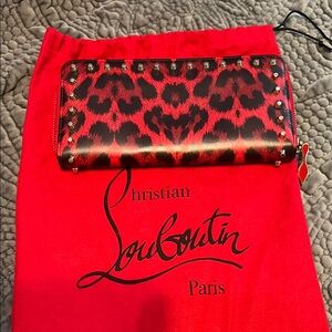 LIKE NEW CHRISTIAN LOUBOUTIN RED LEPORD WALLET💗💗💗PRICED TO SELL🔥🔥